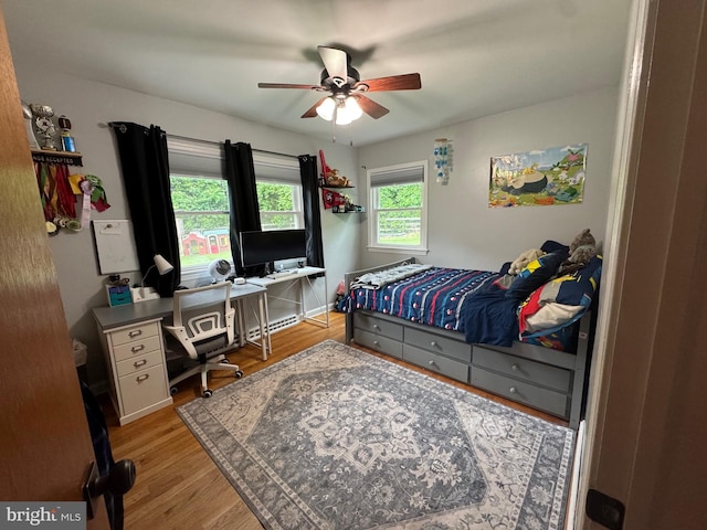 15510 Baden Naylor Rd, Brandywine, MD 20613 - bedroom featuring an office area, light wood-style flooring, and a ceiling fan