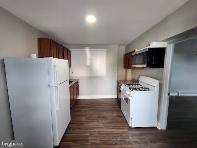 1000 E Preston St, Baltimore, MD 21202 - kitchen featuring white appliances, baseboards, dark wood-style floors, and light countertops