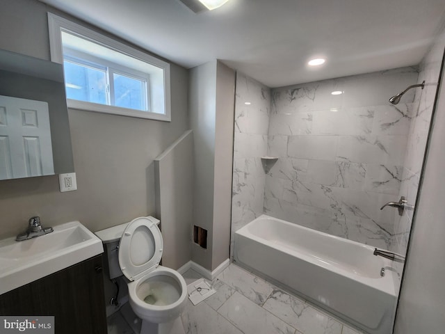 1000 E Preston St, Baltimore, MD 21202 - bathroom with marble finish floors,  shower combination, baseboards, toilet, and vanity