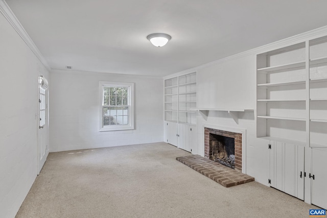 1340 Hilltop Rd, Charlottesville, VA 22903 - unfurnished living room featuring carpet floors, ornamental molding, a brick fireplace, and built in shelves