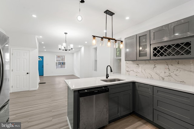 5514 Broomall St, Philadelphia, PA 19143 - kitchen with dishwasher, a sink, gray cabinetry, backsplash, and recessed lighting