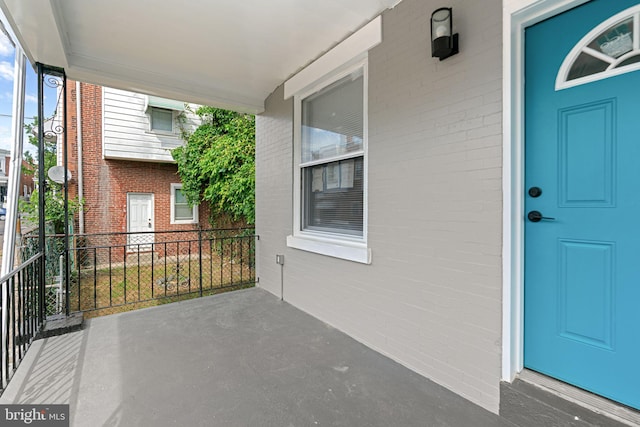 5514 Broomall St, Philadelphia, PA 19143 - entrance to property with brick siding and covered porch