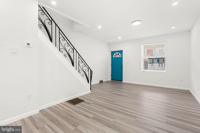 5514 Broomall St, Philadelphia, PA 19143 - foyer entrance featuring stairs, light wood finished floors, baseboards, and recessed lighting