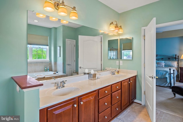 7305 Brookview Rd Unit 207, Elkridge, MD 21075 - ensuite bathroom featuring double vanity and tile patterned flooring