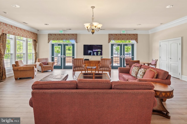 7305 Brookview Rd Unit 207, Elkridge, MD 21075 - living room featuring french doors, a chandelier, ornamental molding, light wood-style floors, and recessed lighting