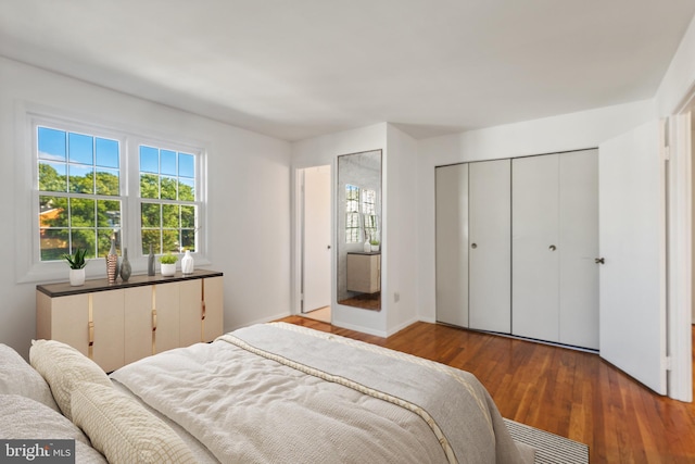 7602 Woodruff Ct, Laurel, MD 20707 - bedroom with wood finished floors and a closet