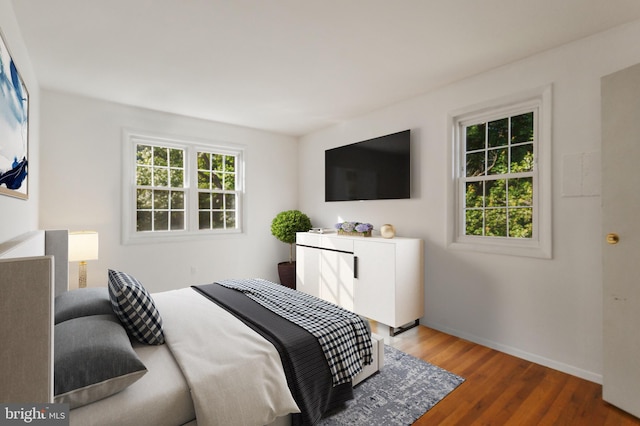 7602 Woodruff Ct, Laurel, MD 20707 - bedroom with wood finished floors and baseboards