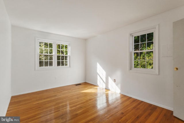 7602 Woodruff Ct, Laurel, MD 20707 - unfurnished room with wood finished floors and baseboards