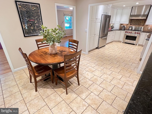 1027 Hart Rd, Baltimore, MD 21286 - dining area with baseboards and light tile patterned floors