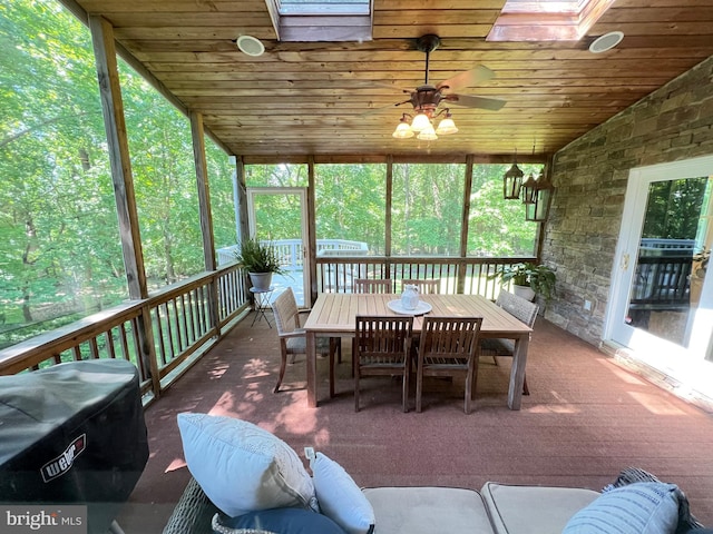 1027 Hart Rd, Baltimore, MD 21286 - sunroom / solarium featuring a skylight, ceiling fan, and outdoor dining area