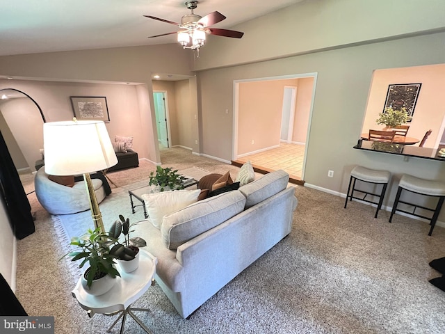 1027 Hart Rd, Baltimore, MD 21286 - carpeted living area featuring vaulted ceiling, ceiling fan, and baseboards