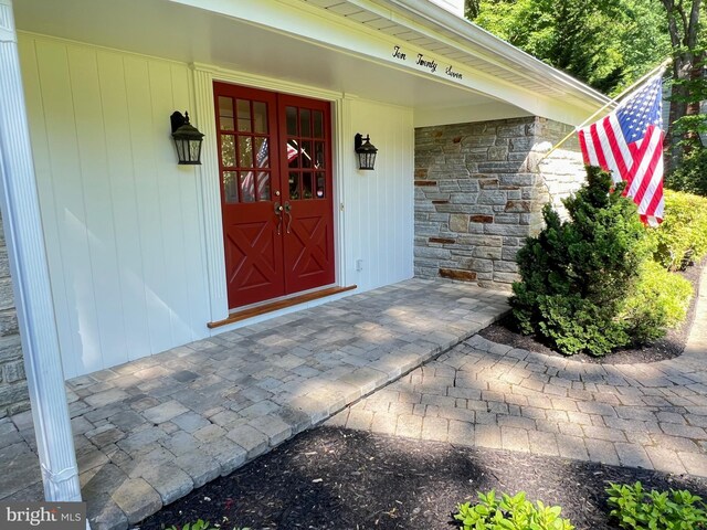 1027 Hart Rd, Baltimore, MD 21286 - view of exterior entry with stone siding and french doors