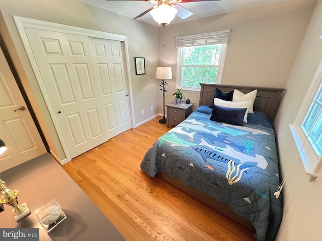 1027 Hart Rd, Baltimore, MD 21286 - bedroom with light wood-style floors, a closet, and ceiling fan