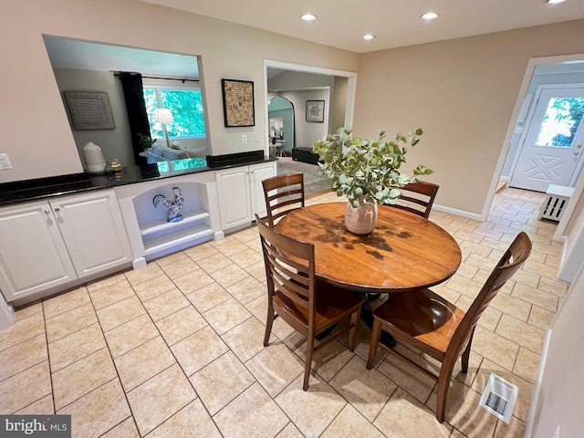 1027 Hart Rd, Baltimore, MD 21286 - dining space with recessed lighting, baseboards, and arched walkways