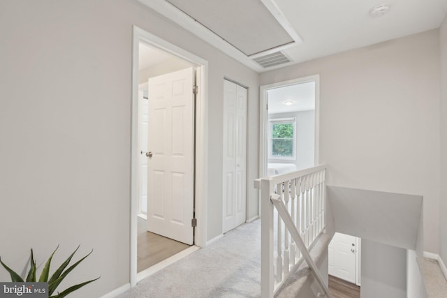 6842 Heatherway Ct, Alexandria, VA 22315 - hallway featuring an upstairs landing, carpet flooring, and baseboards