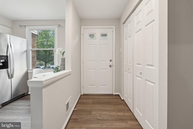 6842 Heatherway Ct, Alexandria, VA 22315 - entryway with dark wood-style floors and baseboards