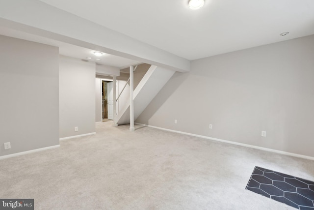 6842 Heatherway Ct, Alexandria, VA 22315 - finished basement featuring carpet floors, baseboards, and stairway