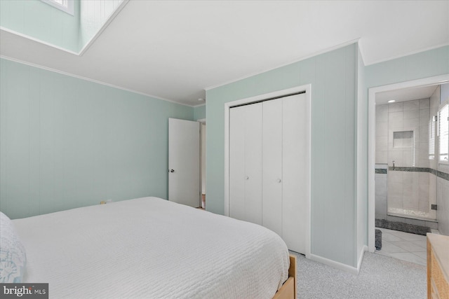 537 Candlelight Ln, Bethany Beach, DE 19930 - carpeted bedroom featuring ornamental molding, a closet, and ensuite bathroom