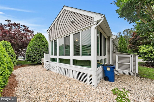 537 Candlelight Ln, Bethany Beach, DE 19930 - view of property exterior featuring a sunroom