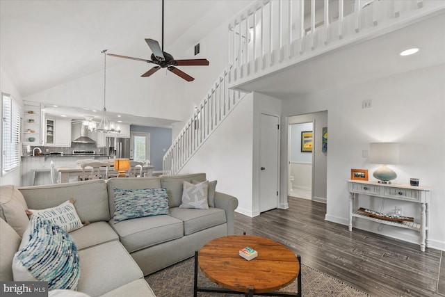 537 Candlelight Ln, Bethany Beach, DE 19930 - living room featuring ceiling fan, a chandelier, dark wood-type flooring, high vaulted ceiling, and baseboards