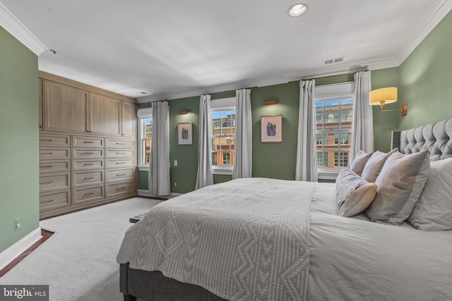 54 Wolfe St, Alexandria, VA 22314 - carpeted bedroom with ornamental molding and baseboards
