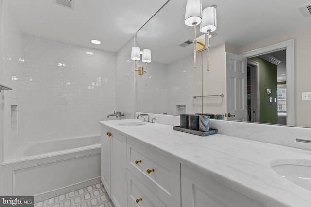 54 Wolfe St, Alexandria, VA 22314 - bathroom with double vanity,  shower combination, and tile patterned floors