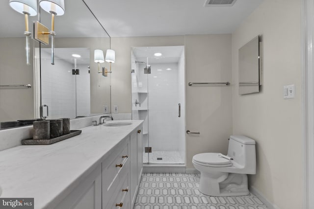 54 Wolfe St, Alexandria, VA 22314 - full bathroom featuring a stall shower, toilet, tile patterned flooring, vanity, and baseboards