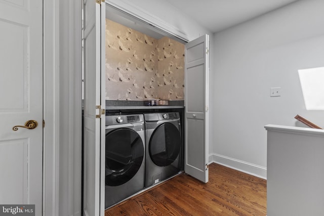 54 Wolfe St, Alexandria, VA 22314 - laundry area featuring washer and dryer, dark wood-type flooring, and baseboards