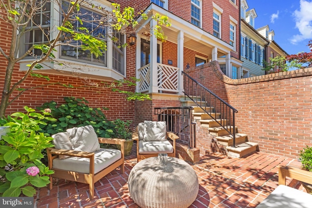 54 Wolfe St, Alexandria, VA 22314 - view of patio / terrace featuring stairway
