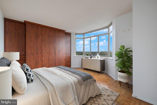 4801 Fairmont Ave Unit 804, Bethesda, MD 20814 - bedroom with radiator and baseboards