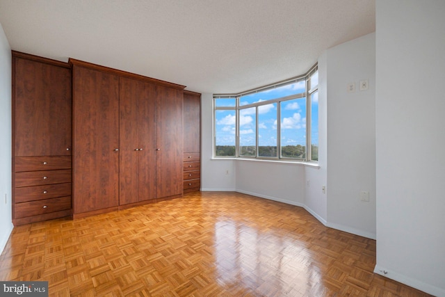 4801 Fairmont Ave Unit 804, Bethesda, MD 20814 - unfurnished bedroom with baseboards