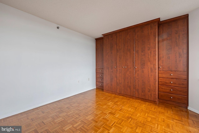 4801 Fairmont Ave Unit 804, Bethesda, MD 20814 - unfurnished bedroom with baseboards and a closet