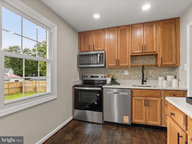 13214 Holdridge Rd, Silver Spring, MD 20906 - kitchen with appliances with stainless steel finishes, a sink, healthy amount of natural light, light countertops, and recessed lighting