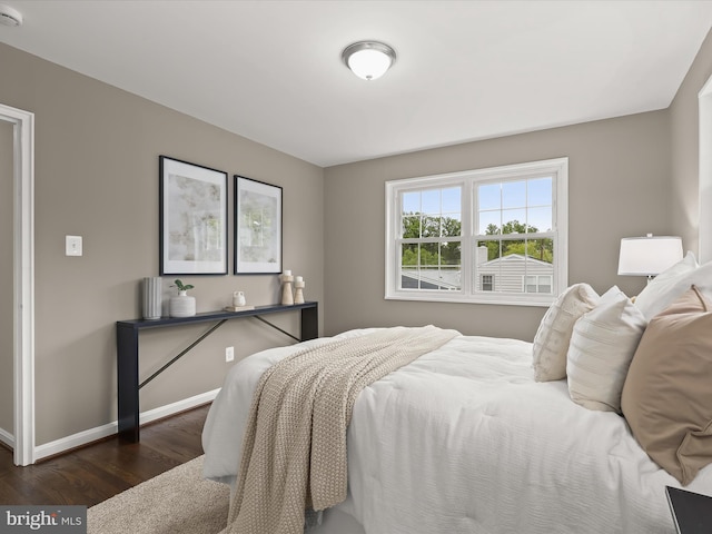 13214 Holdridge Rd, Silver Spring, MD 20906 - bedroom featuring dark wood-style flooring and baseboards