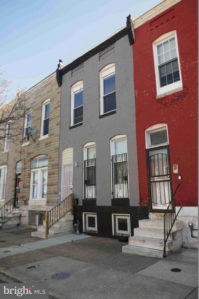 713 N Payson St, Baltimore, MD 21217 - view of property featuring entry steps