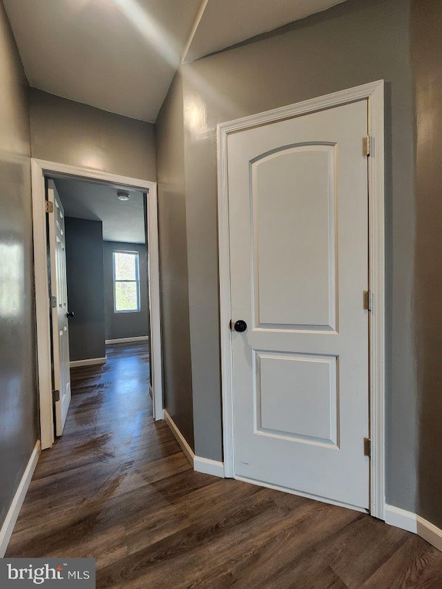 713 N Payson St, Baltimore, MD 21217 - hallway featuring wood finished floors and baseboards