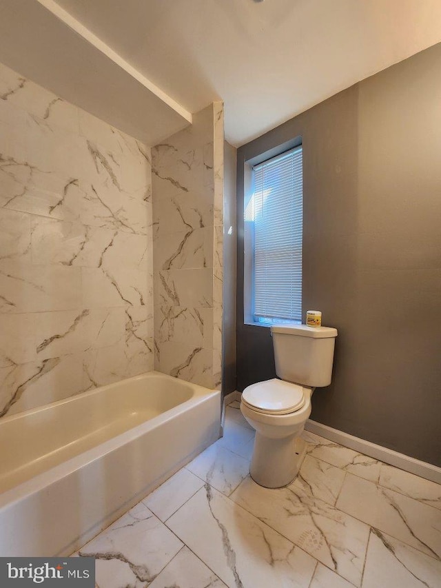 713 N Payson St, Baltimore, MD 21217 - full bathroom with marble finish floors, toilet, and baseboards