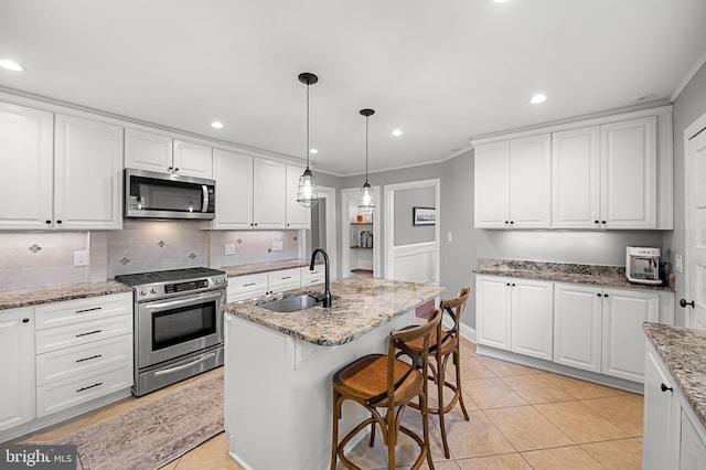 1602 S Rolling Rd, Halethorpe, MD 21227 - kitchen featuring appliances with stainless steel finishes, a sink, white cabinets, recessed lighting, and tasteful backsplash