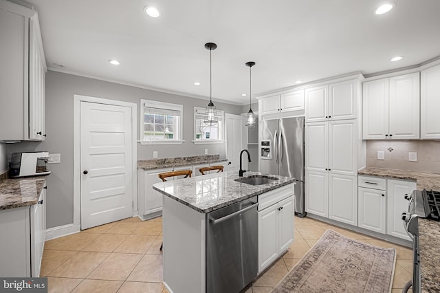1602 S Rolling Rd, Halethorpe, MD 21227 - kitchen featuring appliances with stainless steel finishes, white cabinetry, light tile patterned flooring, ornamental molding, and a sink