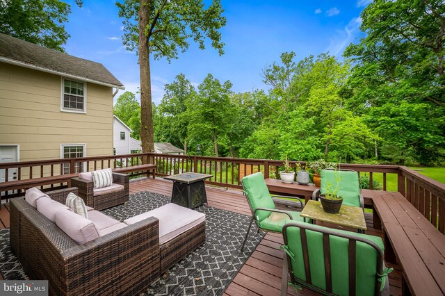 1602 S Rolling Rd, Halethorpe, MD 21227 - wooden deck featuring an outdoor living space