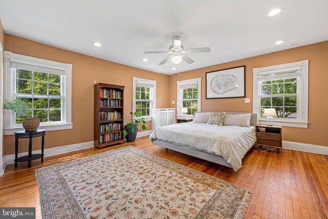 1602 S Rolling Rd, Halethorpe, MD 21227 - bedroom with light wood-type flooring, baseboards, recessed lighting, and a ceiling fan