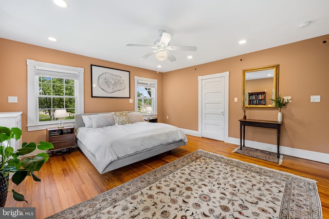 1602 S Rolling Rd, Halethorpe, MD 21227 - bedroom with multiple windows, wood finished floors, and recessed lighting