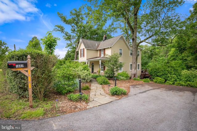 1602 S Rolling Rd, Halethorpe, MD 21227 - view of front of house featuring a chimney