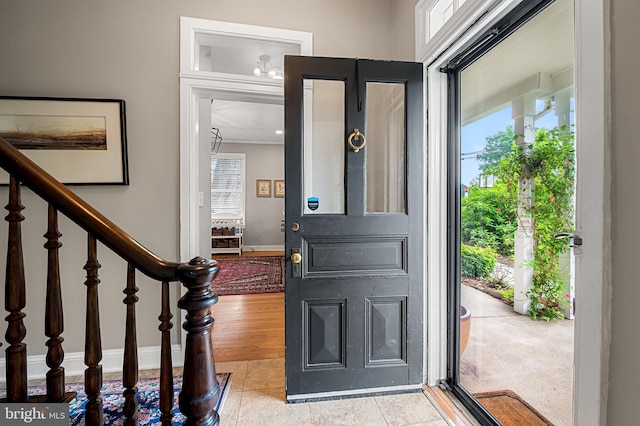1602 S Rolling Rd, Halethorpe, MD 21227 - foyer featuring light tile patterned flooring and baseboards