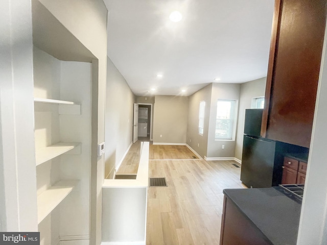 978 N 45th St, Philadelphia, PA 19104 - kitchen with freestanding refrigerator, light wood finished floors, baseboards, recessed lighting, and dark countertops