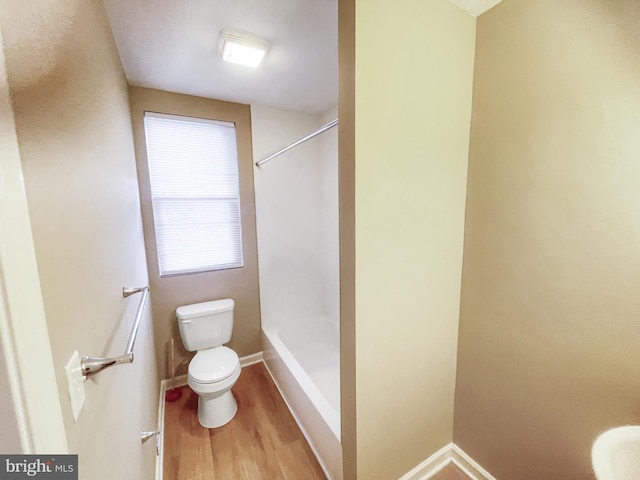 978 N 45th St, Philadelphia, PA 19104 - full bathroom featuring toilet, wood finished floors, shower / bathtub combination, and baseboards