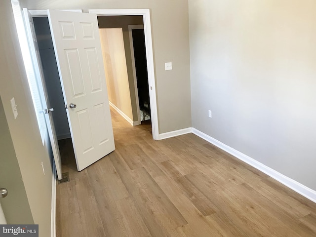 978 N 45th St, Philadelphia, PA 19104 - unfurnished bedroom featuring baseboards and light wood finished floors