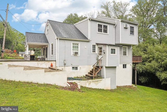 228 Balligomingo Rd, Conshohocken, PA 19428 - back of house featuring a yard and roof with shingles