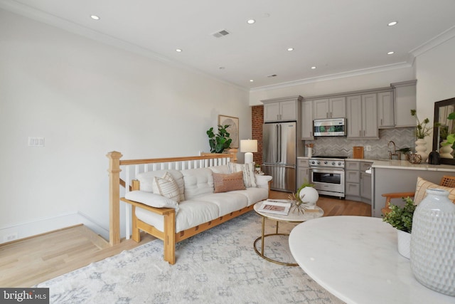 408 M St NW Unit 4, Washington, DC 20001 - living room with light wood-style flooring, crown molding, recessed lighting, and baseboards