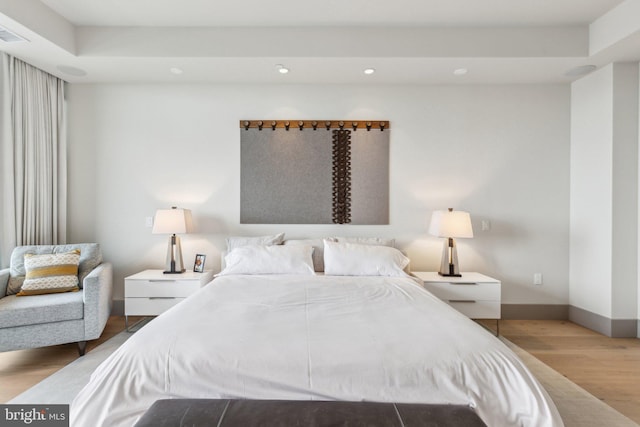 1881 N Nash St Unit 2309, Arlington, VA 22209 - bedroom with wood finished floors, recessed lighting, and baseboards